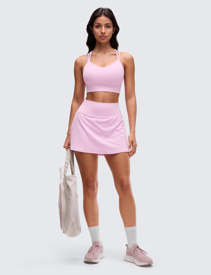 Softness Mold Butterluxe Strappy Longline Sports Brasor Women -Double in pink, model wearing matching sports outfit.